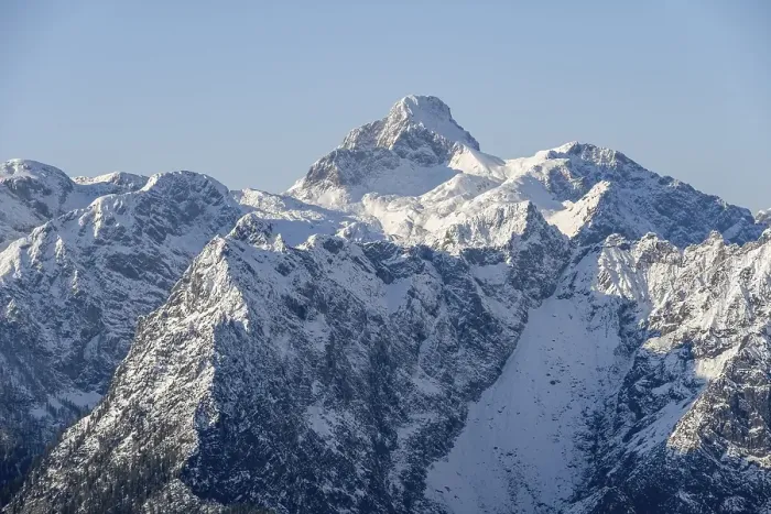 Framed Print : Steep rocky mountain peaks with snow
