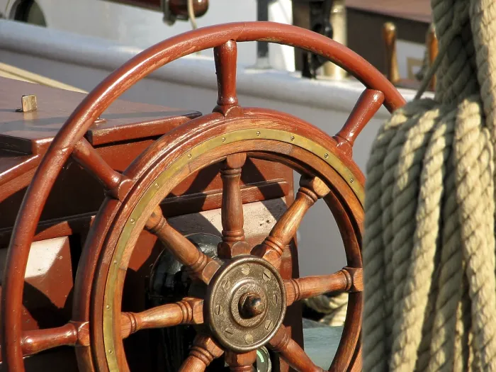 Framed Print : Steering wheel on a traditional sailing ship