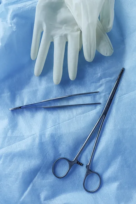 Framed Print : Sterile gloves and tools on blue background Framed Print : Sterile gloves and tools on blue background