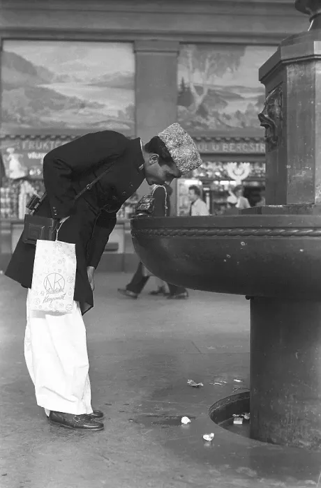 Framed Print : Stockholm Central Station in 1954. The large central hall is where everyone passes from and to the trains. A man, visibly a passing tourist drinks from the public water fountain. Sweden Kristoffersson ref 1-23 Framed Print : Stockholm Central Station in 1954. The large central hall is where everyone passes from and to the trains. A man, visibly a passing tourist drinks from the public water fountain. Sweden Kristoffersson ref 1-23