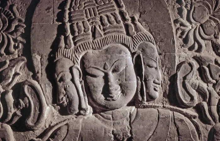 Framed Print : Stone Buddha half-relief with three faces in Nanapaya Temple