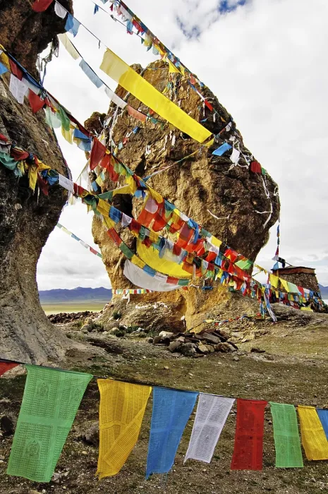 Framed Print : The Stone Couple and prayer flags