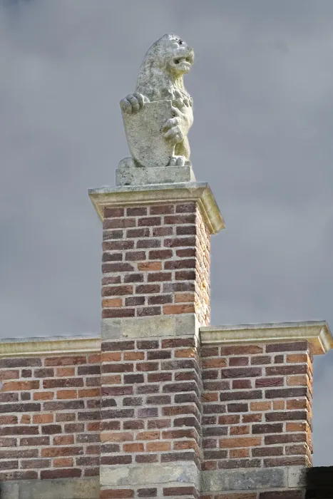 Framed Print : Stone lion on medieval gable and house roof in the netherlands Framed Print : Stone lion on medieval gable and house roof in the netherlands