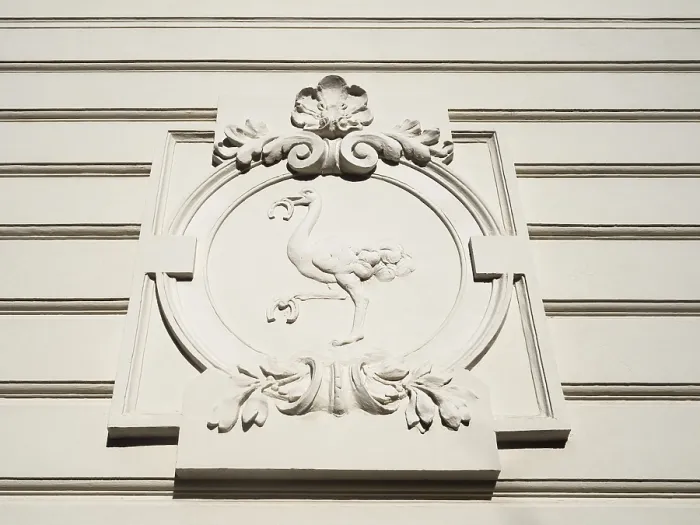 Framed Print : Stone sculpture, bird ostrich with horseshoe in beak Framed Print : Stone sculpture, bird ostrich with horseshoe in beak