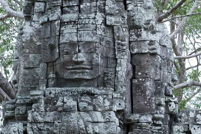 Framed Print : Stone sculpture, face of Bodhisattva Lokeshvara on a monumental tower in the Ta Som Buddhist Temple