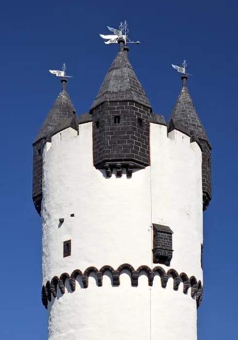Framed Print : Keep with stone spire and smaller turrets on the battlements against a blue sky