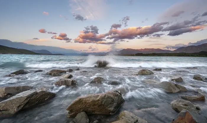 Framed Print : Stones on shore, lake with sunset swell Framed Print : Stones on shore, lake with sunset swell