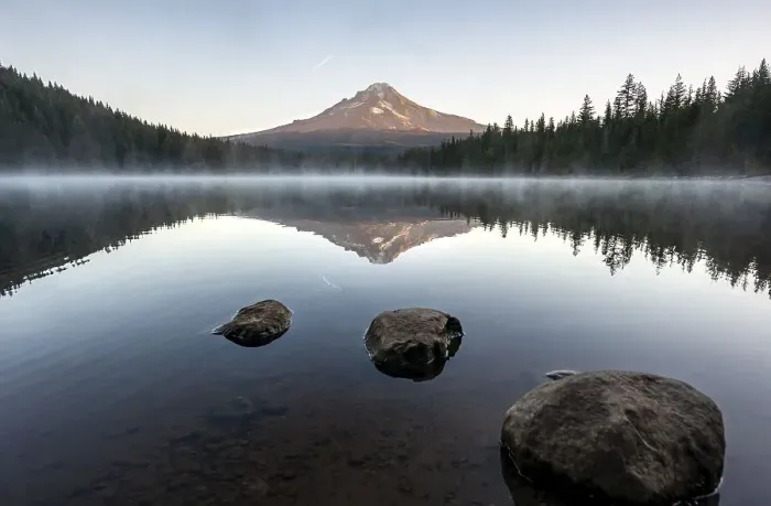 Framed Print : Three stones in the water, reflection of the volcano Mt