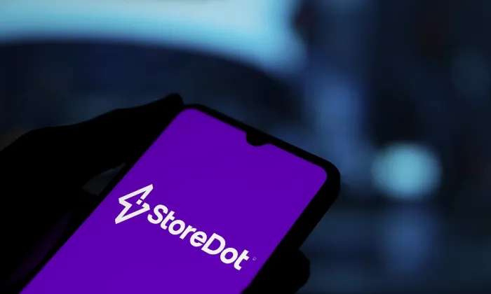 Framed Print : storedot logo is displayed on smartphone Framed Print : storedot logo is displayed on smartphone