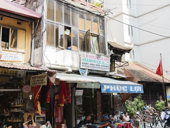 Framed Print : Street lane in Hanoi with a lot of town lives Street lane in Hanoi with a lot of town lives