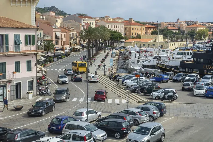 Framed Print : Street and traffic at the harbor in town of Maddalena