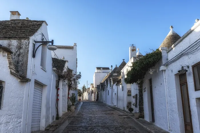 Framed Print : Empty streets of Alberobello in the morning