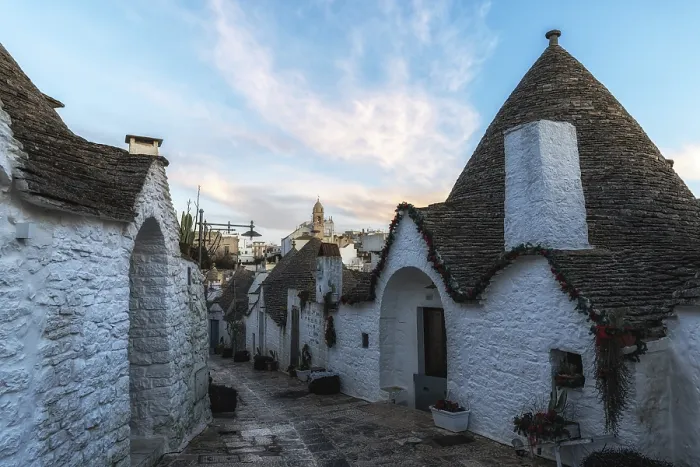 Framed Print : Empty streets of Trulli houses in Alberobello in the morning
