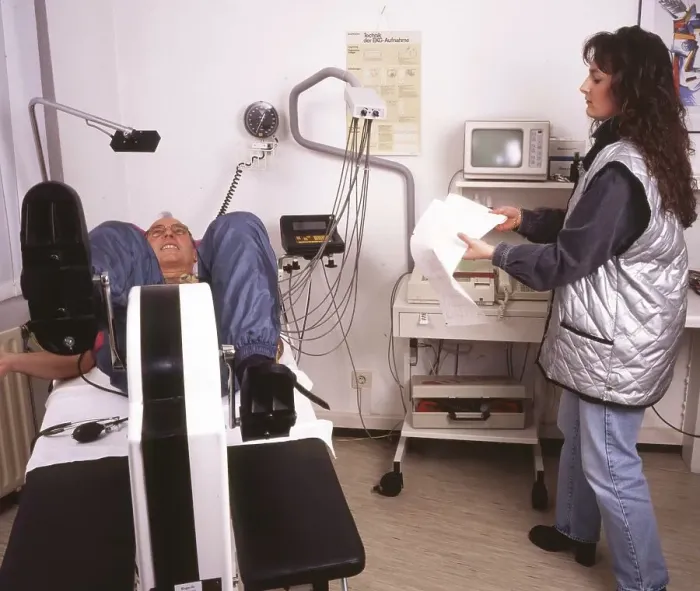 Framed Print : A stress ECG is performed on a patient in a cardiology practice in Iserlohn