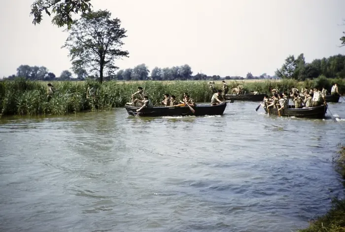 Framed Print : Students taking part in military exercises as army cadets, South of England, United Kingdom, late 1950s, paddling in boats on a river, Europe