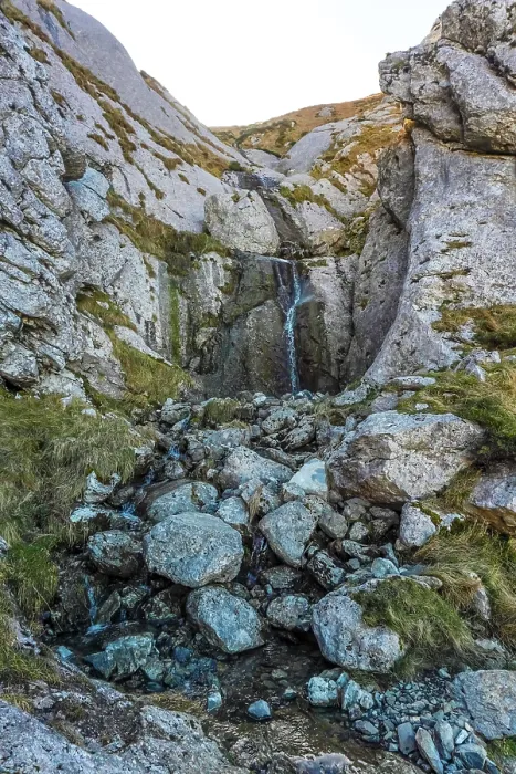 Framed Print : Stunning waterfall cascades down rugged rocks in mount txindoki