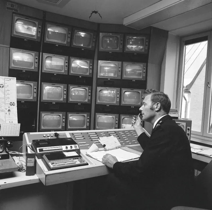 Framed Print : Subway safety in the 1970s. The feed from the subway surveillance cameras are monitored Framed Print : Subway safety in the 1970s. The feed from the subway surveillance cameras are monitored