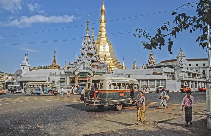 Framed Print : The Sule Pagoda and old buses, Rangoon
