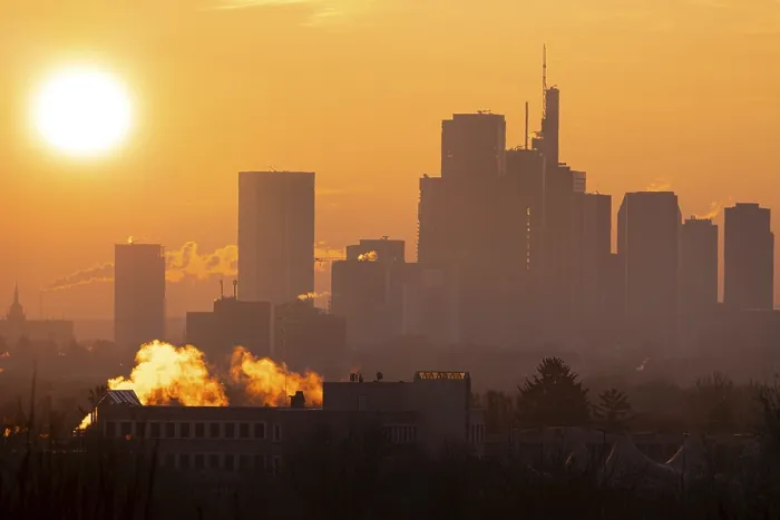 Framed Print : The sun rises behind Frankfurt's banking skyline