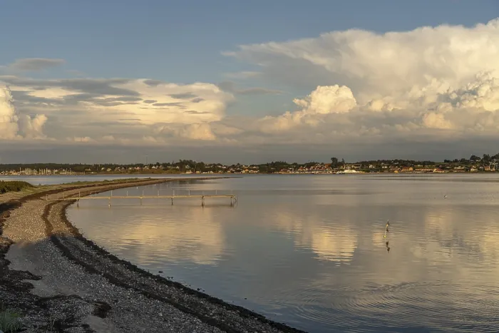 Framed Print : Sundsore beach on the Limfjord with a view of Hvalpsund Framed Print : Sundsore beach on the Limfjord with a view of Hvalpsund
