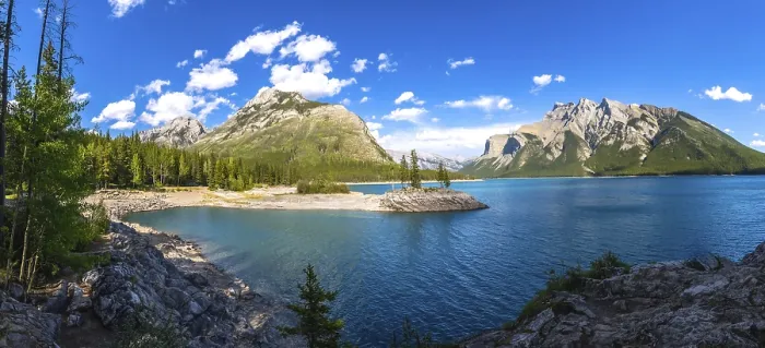 Framed Print : Sunlight illuminating the turquoise waters of lake minnewanka Framed Print : Sunlight illuminating the turquoise waters of lake minnewanka