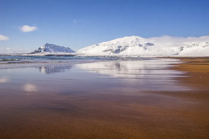 Framed Print : Sunny winter day on the sandy beach in front of Snaefellsjoekull volcano