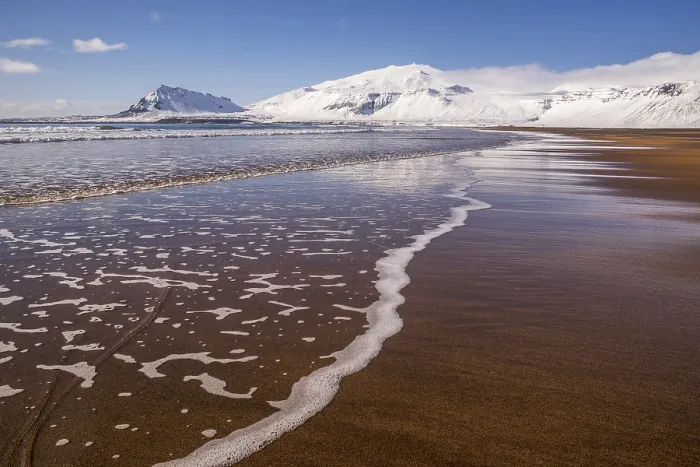 Framed Print : Sunny winter day on the sandy beach in front of Snaefellsjoekull volcano