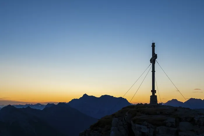 Framed Print : Sunrise with cross of the Thanell summit and Lechtal Alps