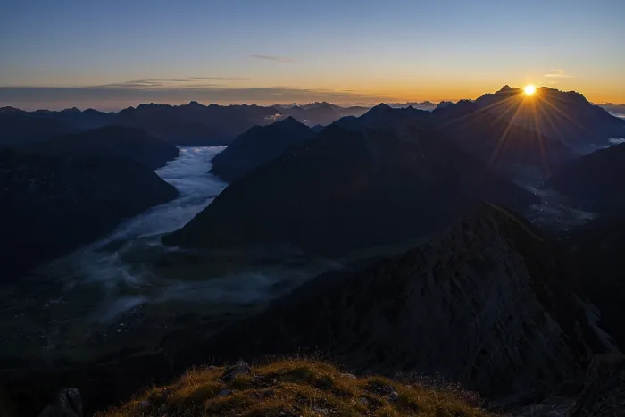 Framed Print : Sunrise over Lechtal Alps with fog in the valley