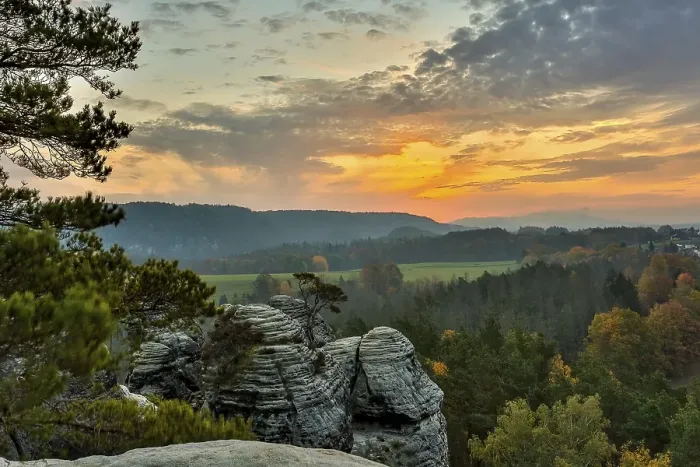 Framed Print : Sunrise in the mountains with a rocky peak in the foreground