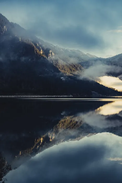 Framed Print : Sunrise with reflections in the Plansee in Tyrol in the Alps in Austria Framed Print : Sunrise with reflections in the Plansee in Tyrol in the Alps in Austria