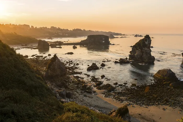 Framed Print : Sunrise, rugged coastal landscape with many rocky islands