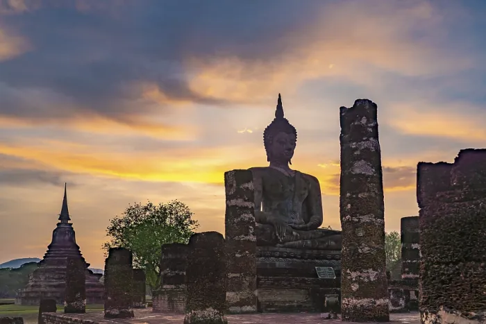 Framed Print : Sunset at a Buddha statue of the temple Wat Mahathat Framed Print : Sunset at a Buddha statue of the temple Wat Mahathat