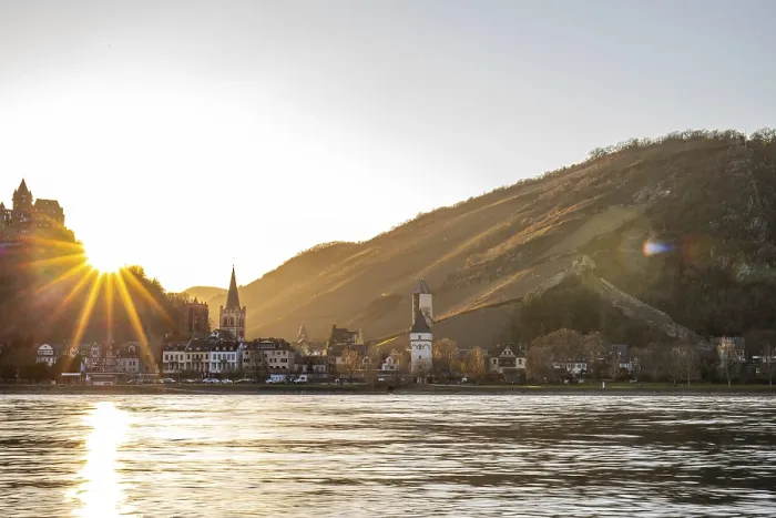 Framed Print : Sunset over the hills by the river