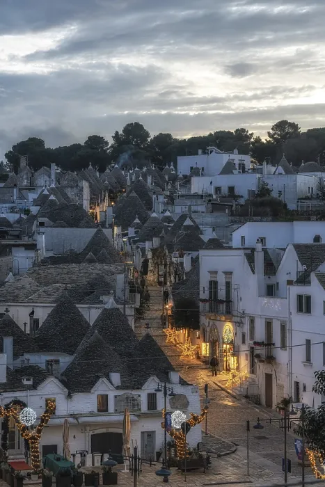 Framed Print : Sunset light over Trulli houses with conical roofs in Alberobello Italy