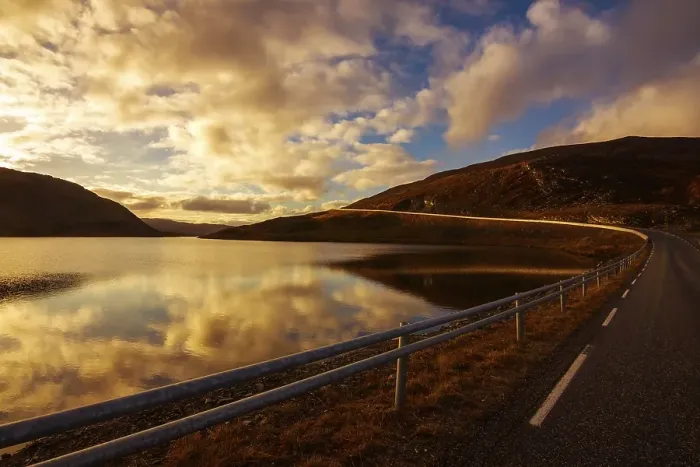 Framed Print : Sunset with lonely road near North Cape