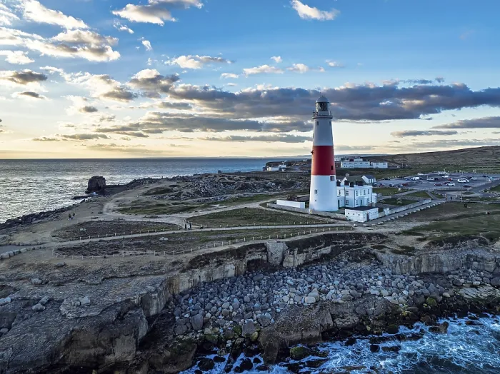 Framed Print : Sunset over Portland Bill Lighthouse from a drone