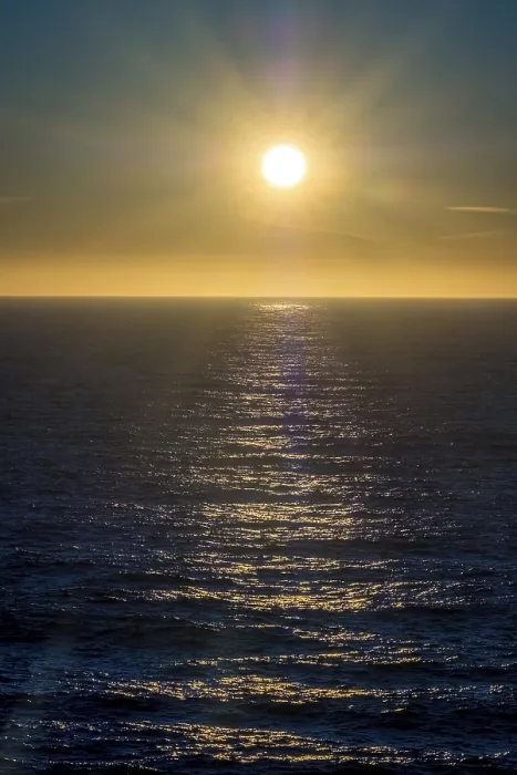 Framed Print : Sunset by the sea with star effect