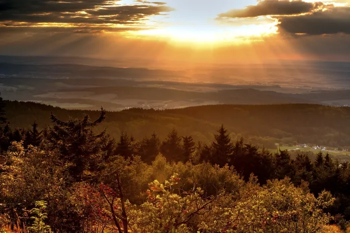 Framed Print : Sunset or sunrise over a low mountain range landscape in Hesse with deciduous trees and conifers Framed Print : Sunset or sunrise over a low mountain range landscape in Hesse with deciduous trees and conifers
