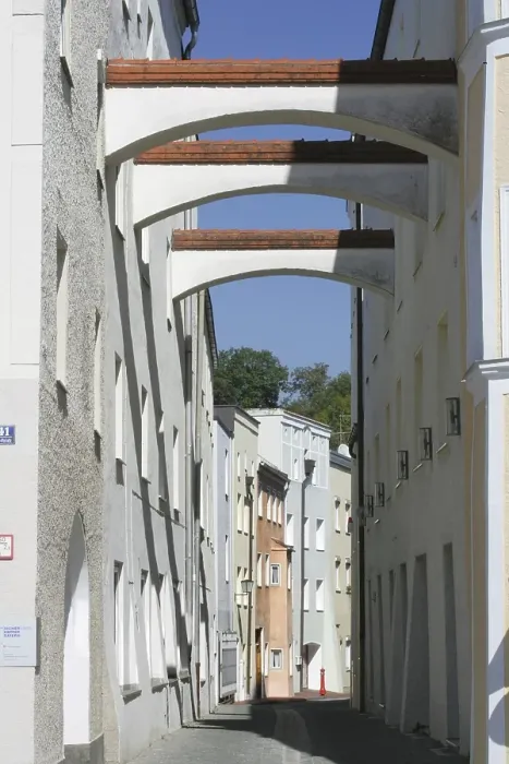 Framed Print : Support beams over an alleyway