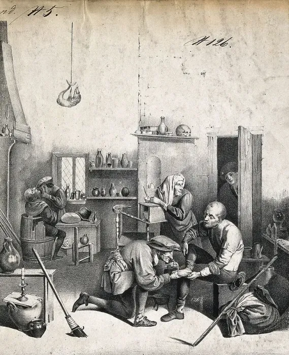 Framed Print : A surgeon treats a patient's foot