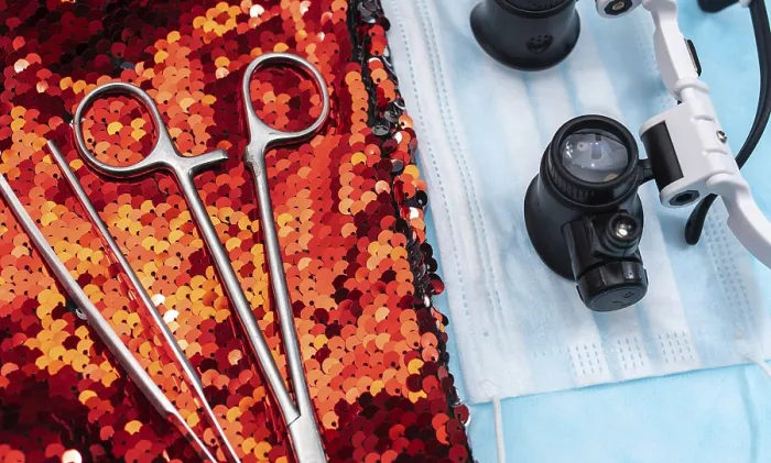 Framed Print : Surgical tools, mask and goggles on vibrant red sequins Framed Print : Surgical tools, mask and goggles on vibrant red sequins