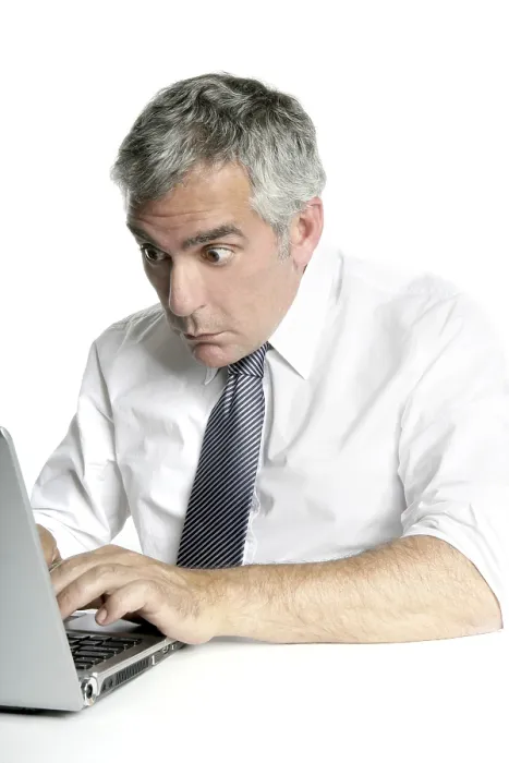 Framed Print : Surprise gesture senior businessman working laptop computer white desk