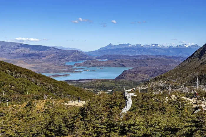 Framed Print : Sweeping views over lakes, forests and distant mountains under a blue sky