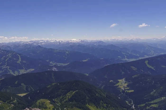 Framed Print : Sweeping views of mountain ranges and snow-capped peaks under a clear sky