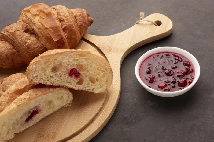 Framed Print : Sweet croissants with jam close up