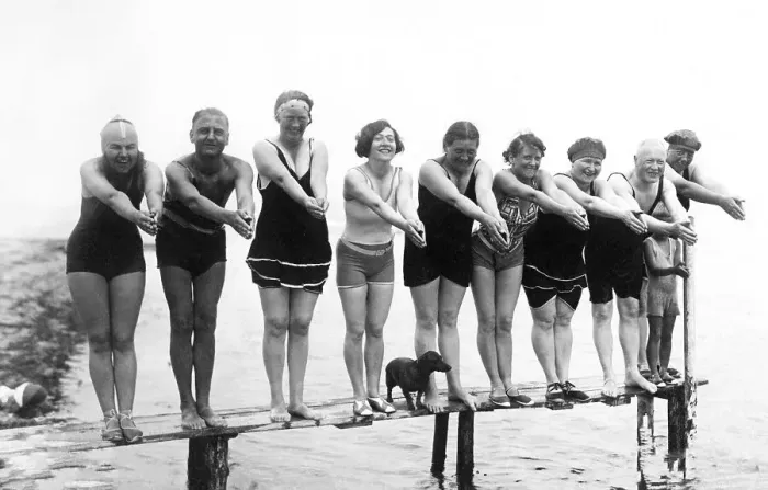 Framed Print : Swimwear, holidays, nine men and women and a dachshund posing on a jetty