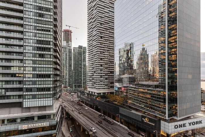 Framed Print : Tall glass buildings in an urban area