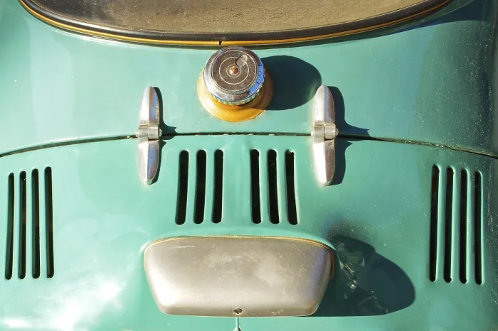 Framed Print : Detail of a tank filling point of an oldtimer car in turquoise colour Framed Print : Detail of a tank filling point of an oldtimer car in turquoise colour