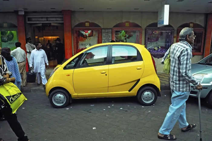 Framed Print : Tata nano car parked on the street